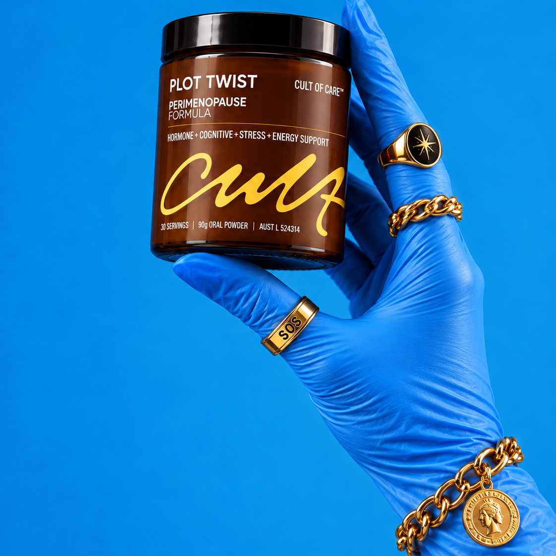 A hand wearing a blue surgical glove holds a jar of Cult of Care Plot Twist Perimenopause Formula against a solid blue background. The jar is dark brown with a black lid and gold lettering.
